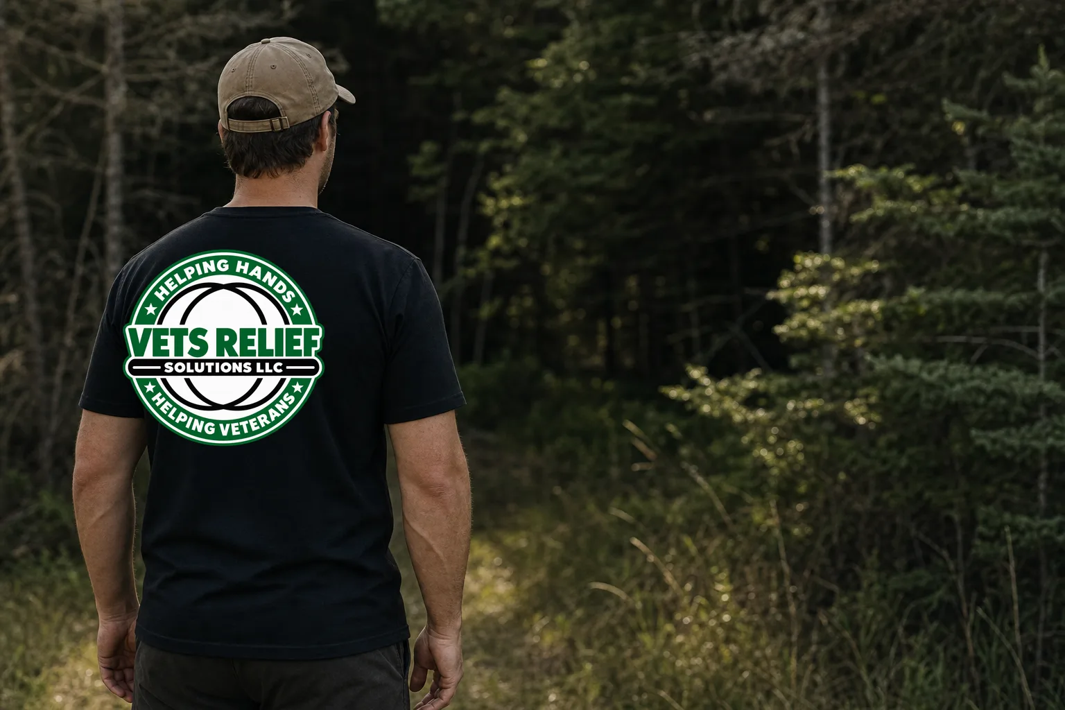 Team member wearing a Vets Relief Solutions shirt, seen from behind